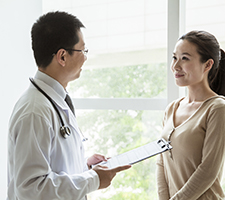 Doctor Assisting Patient